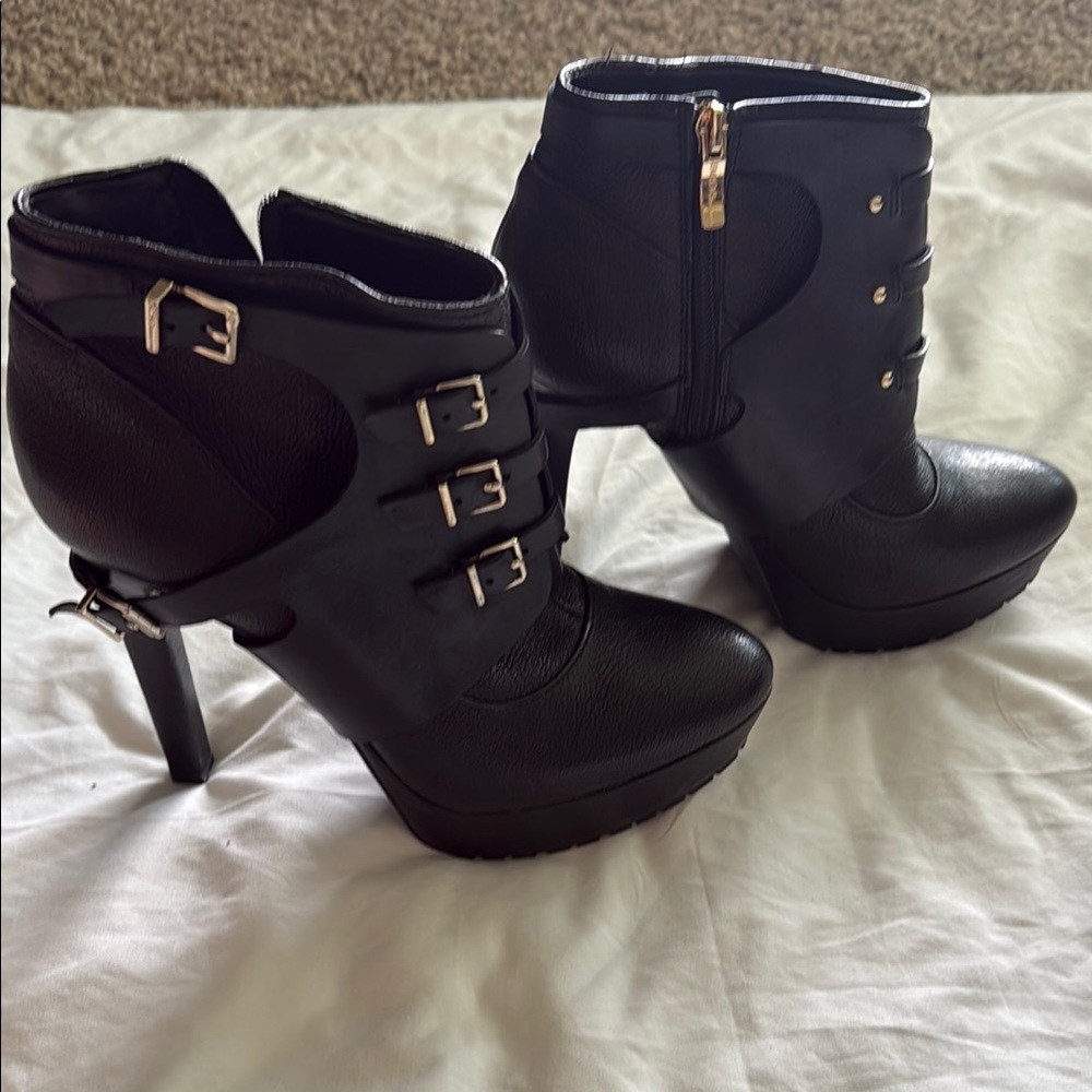 BCBG 
Stylish Black Ankle Boots